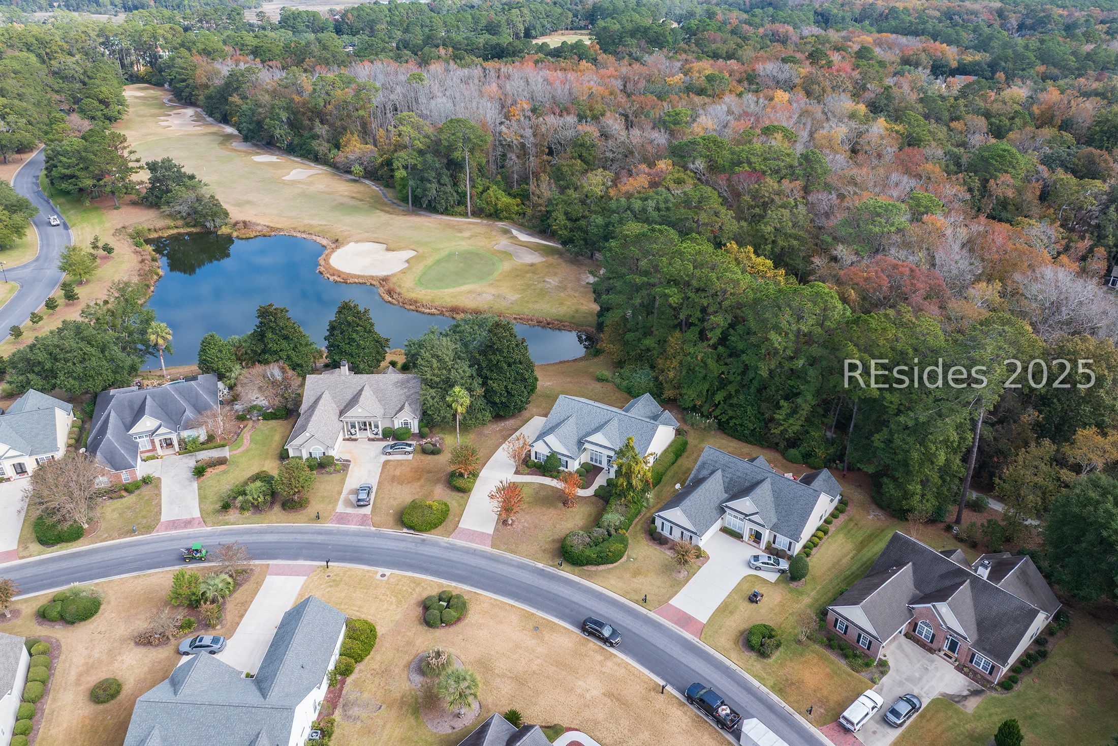 7 Crescent Circle Bluffton, SC 29910 - Photo 5 of 53 Home backs to woods & lagoon of 10th green.