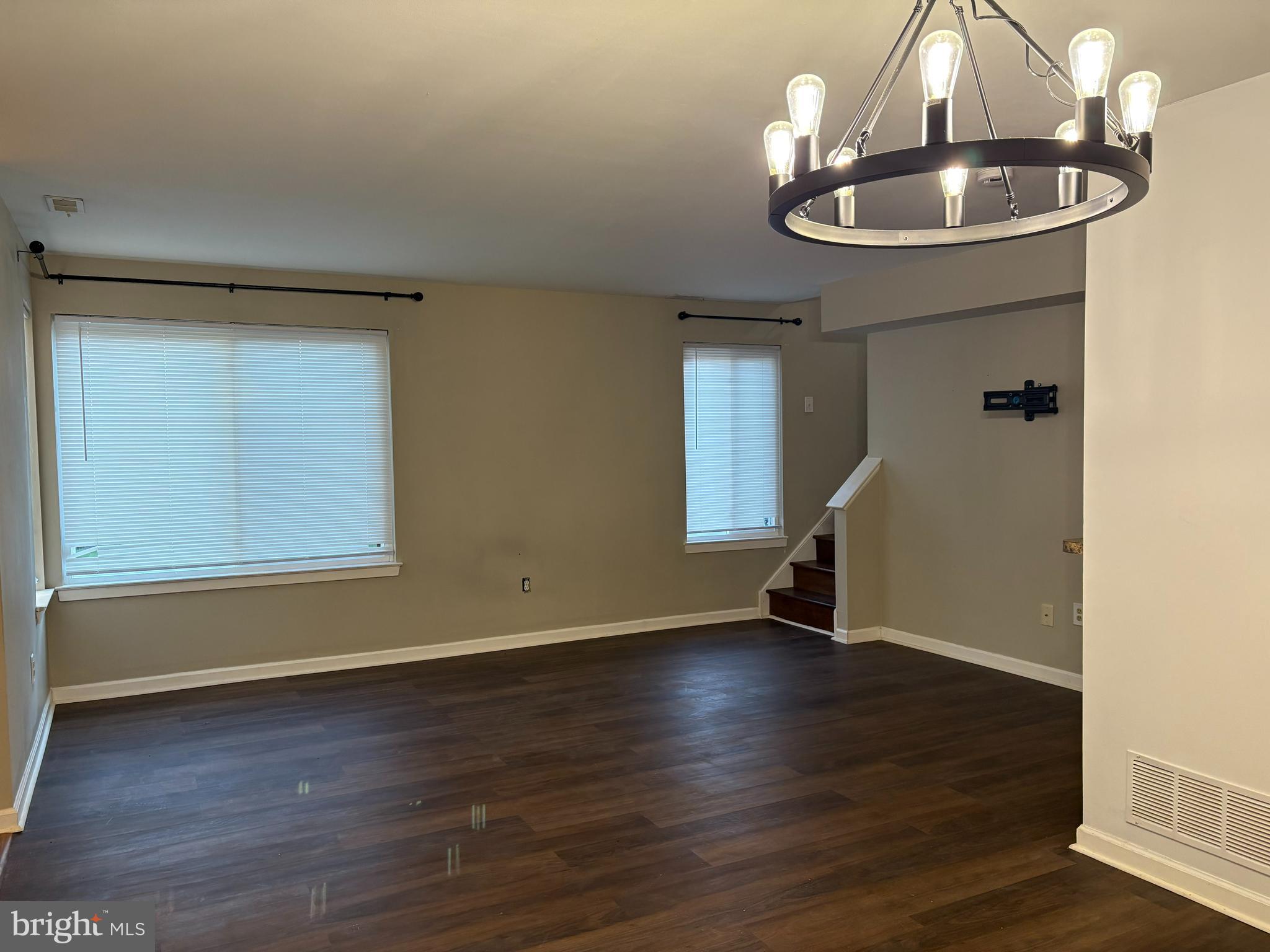 904 Gregorys Way Voorhees, NJ 08043 - Photo 16 of 19 a view of an empty room with wooden floor and a window