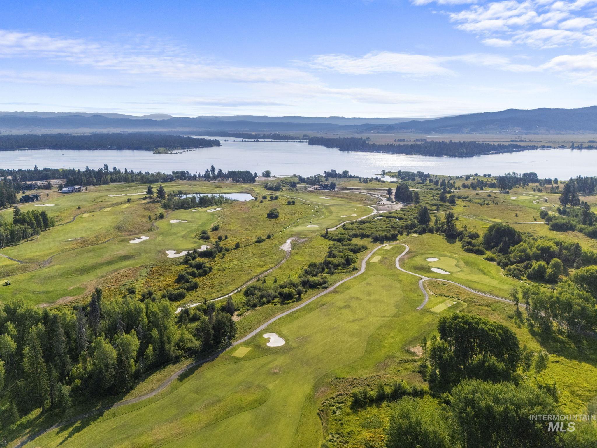 459 Discovery Drive Cascade, ID 83611 - Photo 15 of 17 Aerial view of property's location with a water and mountain view and a golf club