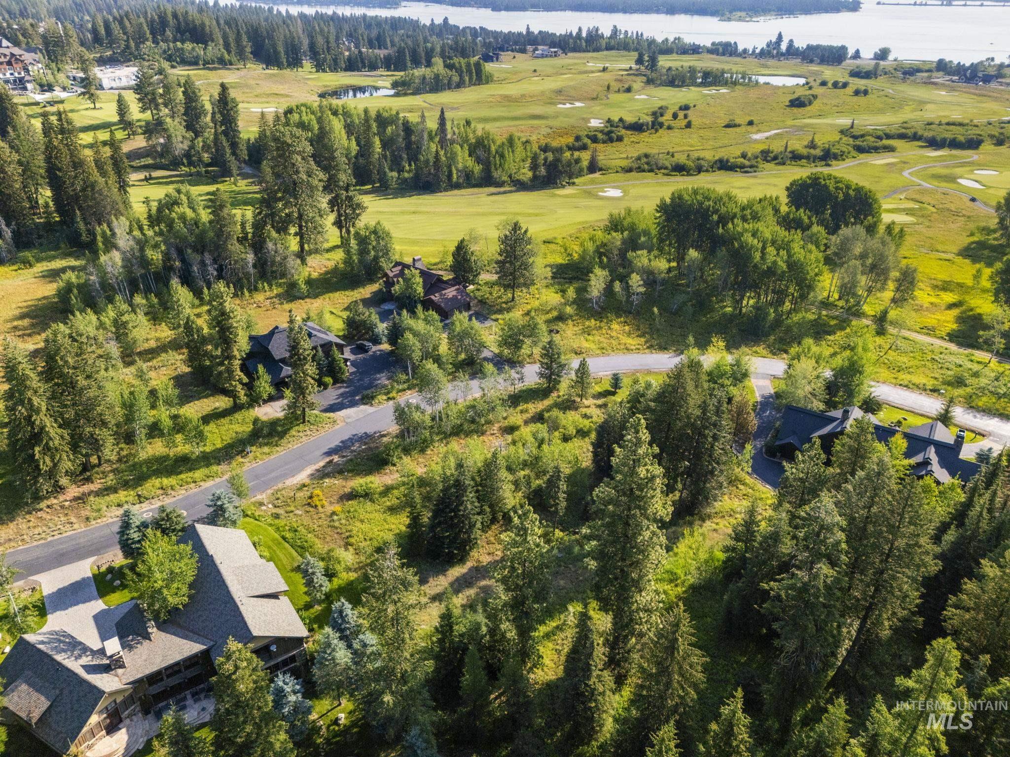 459 Discovery Drive Cascade, ID 83611 - Photo 8 of 17 Aerial view of property's location with a nearby body of water and a local golf course