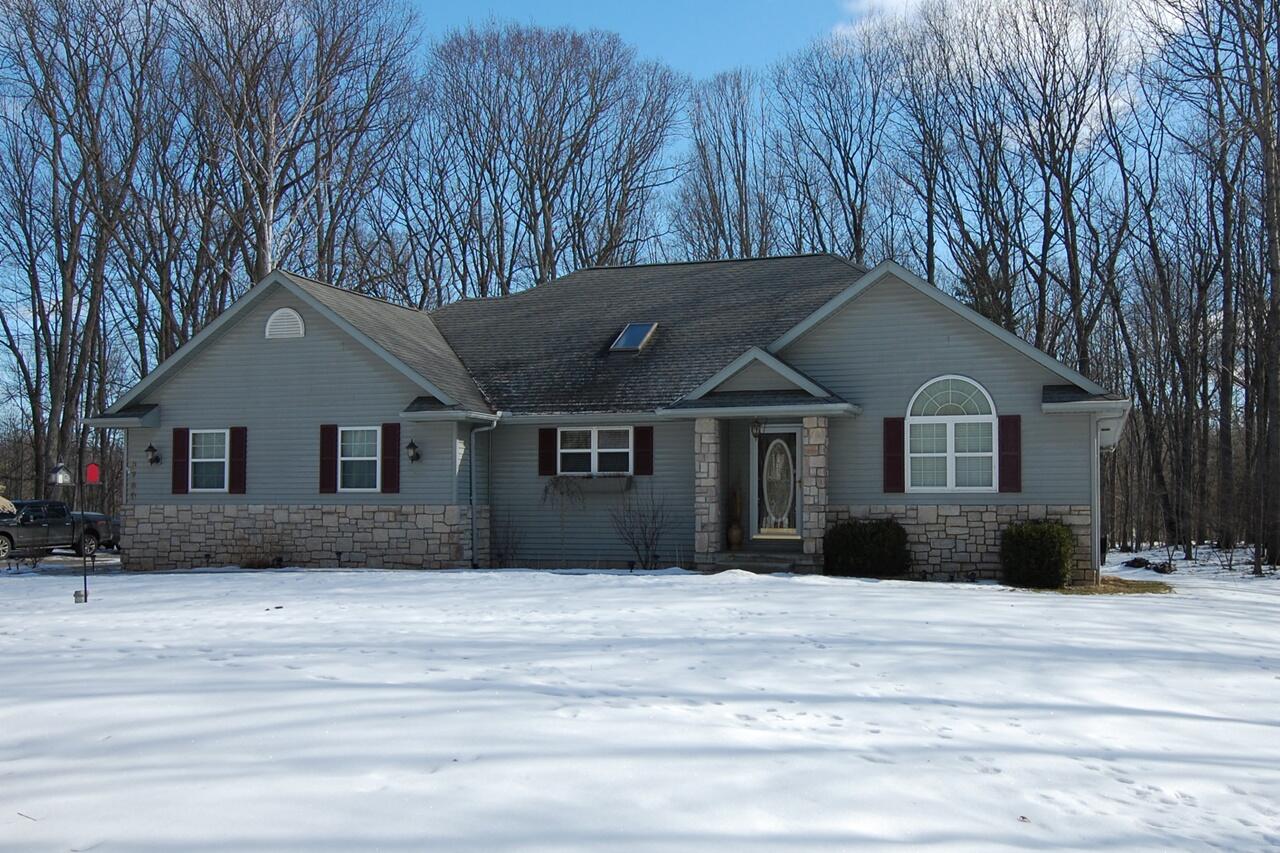 8760 Rambling Way Canadian Lakes, MI 49346 - Photo 1 of 28 1 Front of Home