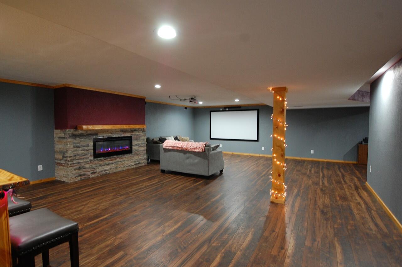 8760 Rambling Way Canadian Lakes, MI 49346 - Photo 10 of 28 11 Rec room with big screen
