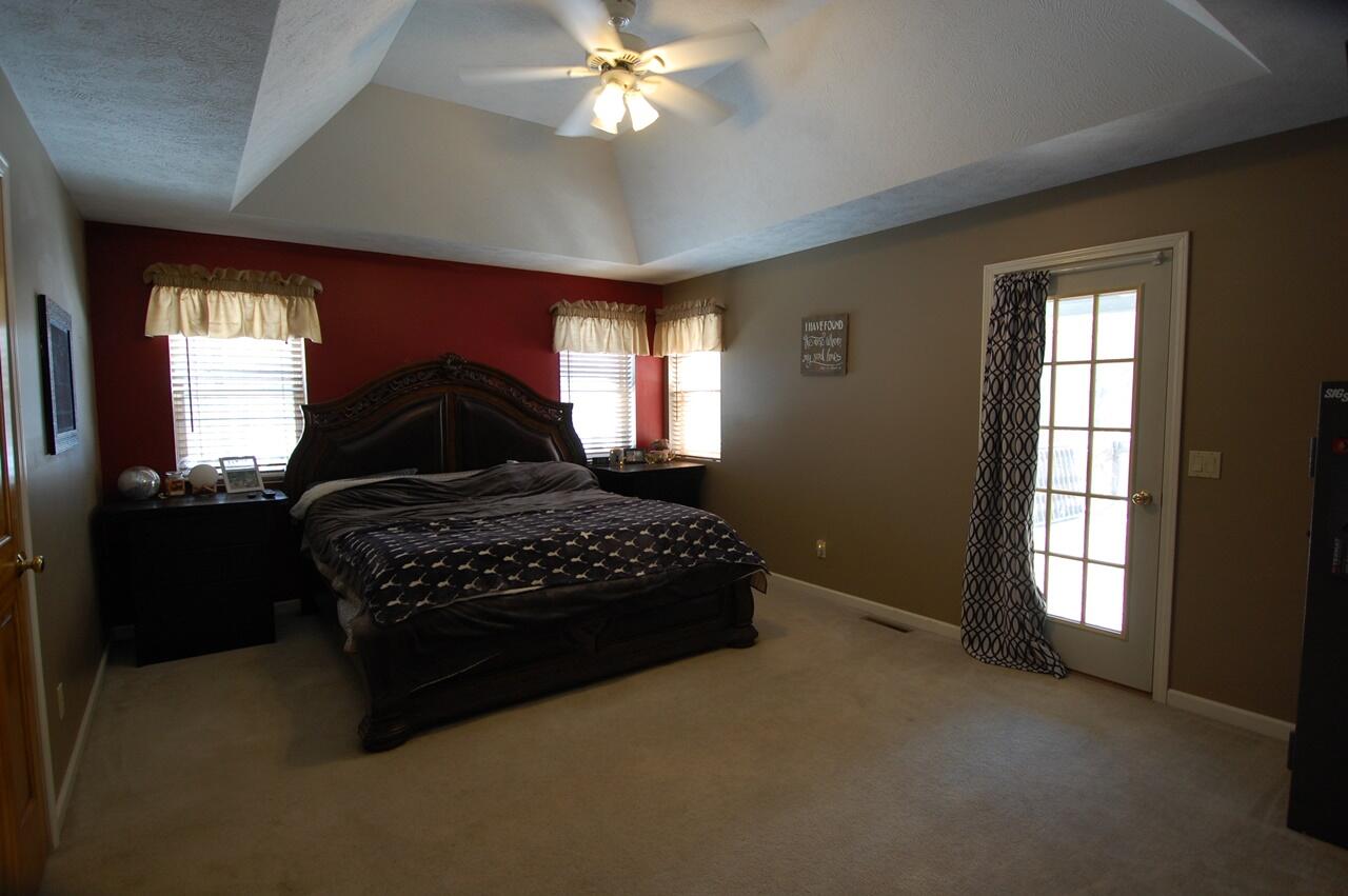 8760 Rambling Way Canadian Lakes, MI 49346 - Photo 13 of 28 14 Master Bedroom