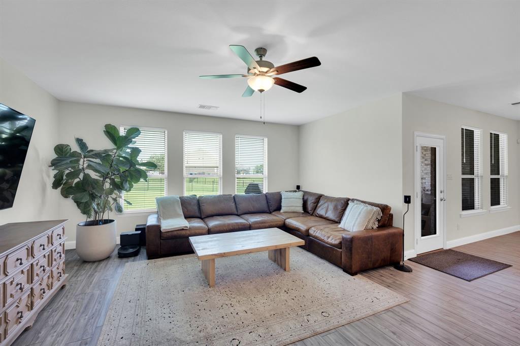 1601 Bear Path Way Gunter, TX 75058 - Photo 15 of 40 a living room with furniture and a large window