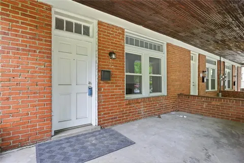 a view of gallery with wooden floor