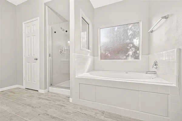 a bathroom with a sink and a bathtub