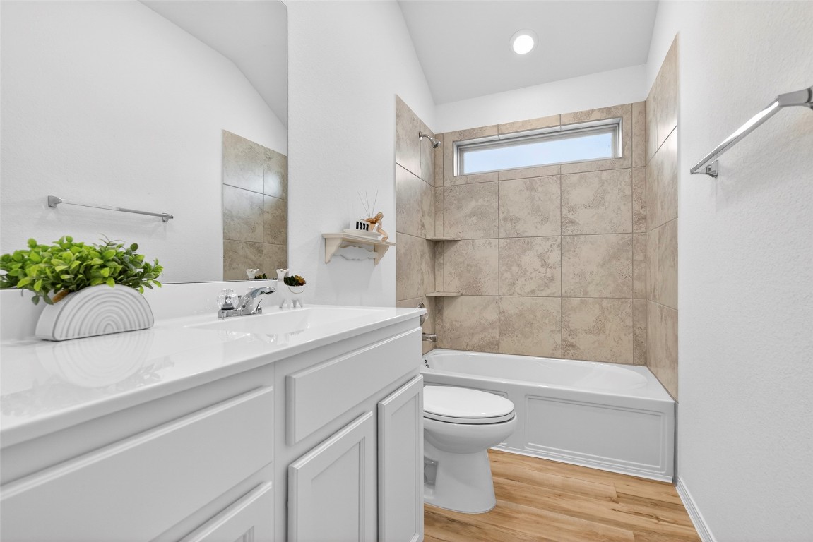 5402 Still Creek Ranch Drive Richmond, TX 77469 - Photo 24 of 32 a bathroom with a sink a toilet and shower