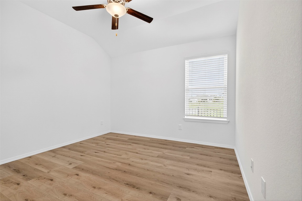 5402 Still Creek Ranch Drive Richmond, TX 77469 - Photo 25 of 32 an empty room with a window