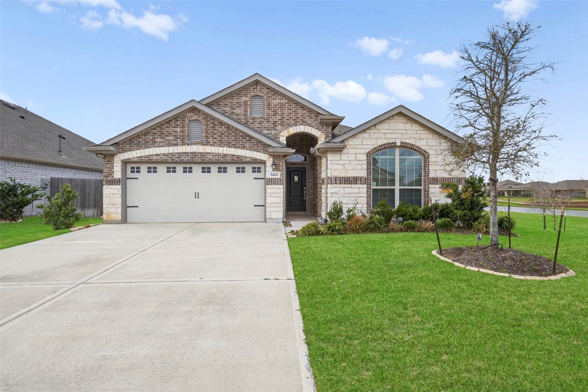 5402 Still Creek Ranch Drive Richmond, TX 77469 - Photo 6 of 32 a view of a house with a yard
