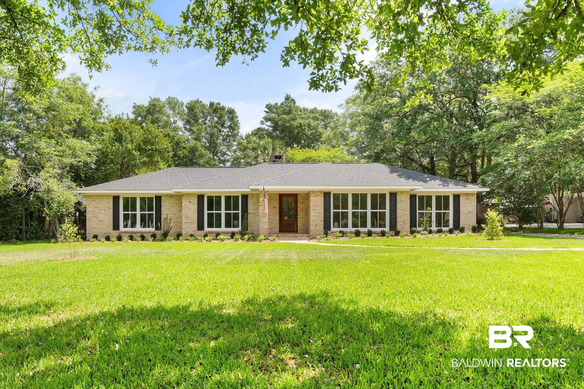 555 East Cumberland Road Mobile, AL 36608 - Photo 1 of 21 Single story home featuring brick siding and a front lawn