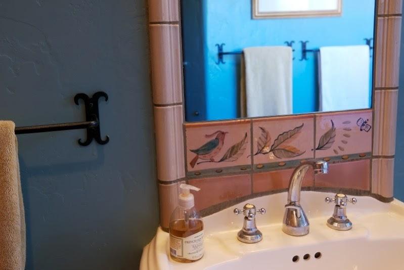 1021 Laguna Street, Unit 4 Santa Barbara, CA 93101 - Photo 12 of 13 a bathroom with a sink and a mirror
