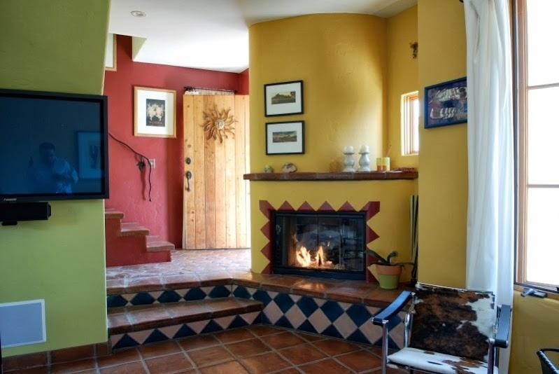 1021 Laguna Street, Unit 4 Santa Barbara, CA 93101 - Photo 3 of 13 a living room with furniture and a fireplace