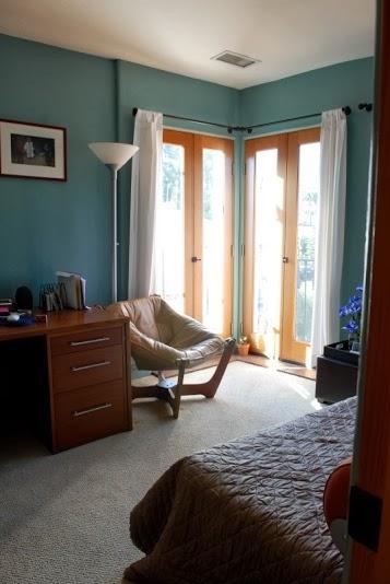1021 Laguna Street, Unit 4 Santa Barbara, CA 93101 - Photo 9 of 13 a bedroom with a bed and windows