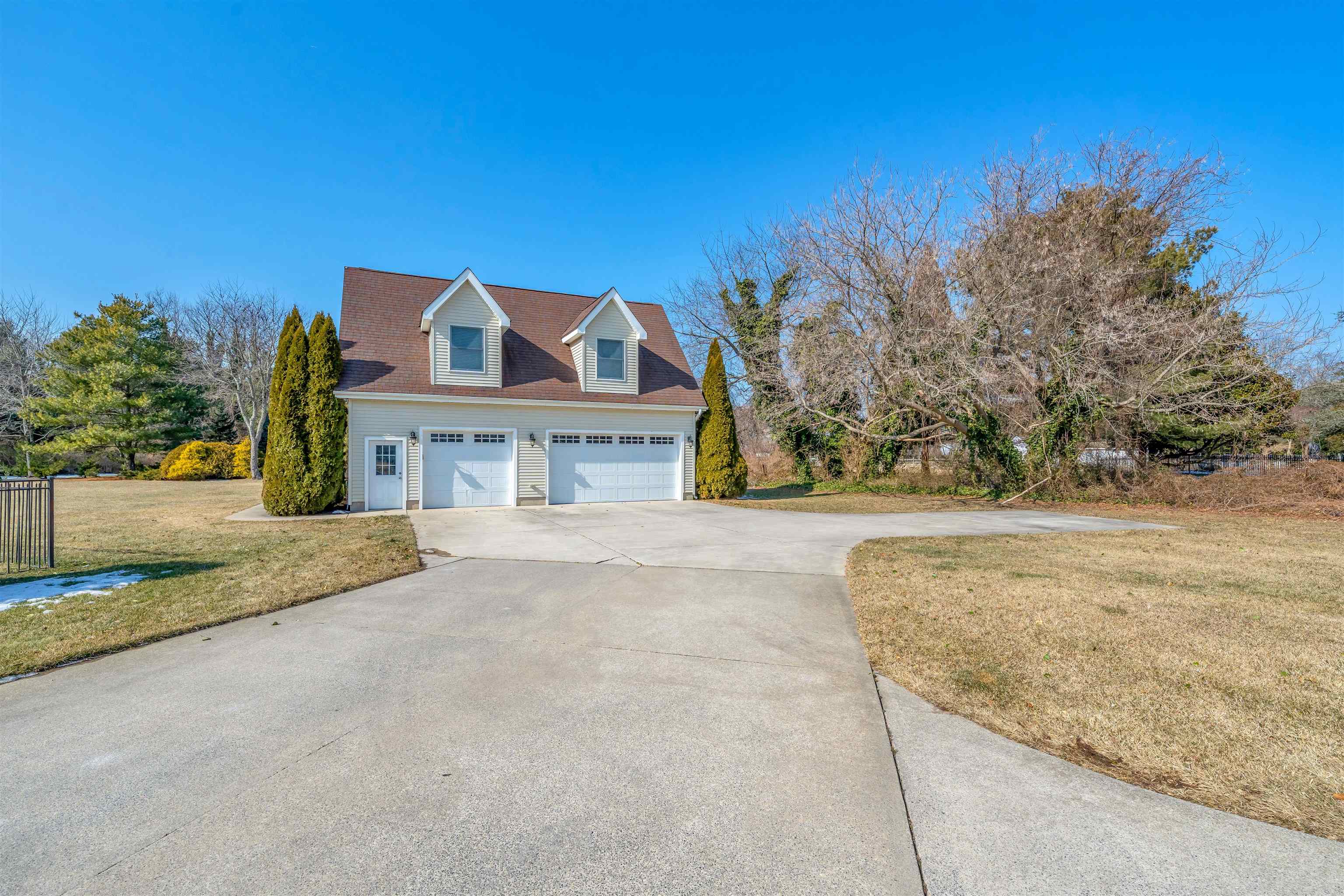 23 Taylor Cold Spring Cape May, NJ 08204 - Photo 35 of 50 a front view of a house with a yard