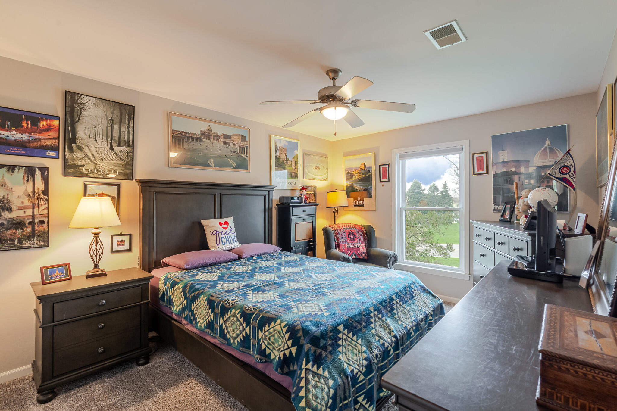 1300 Winding Ridge Lane, Unit A7 Valparaiso, IN 46383 - Photo 15 of 32 a bedroom with a bed a dresser and next to a window