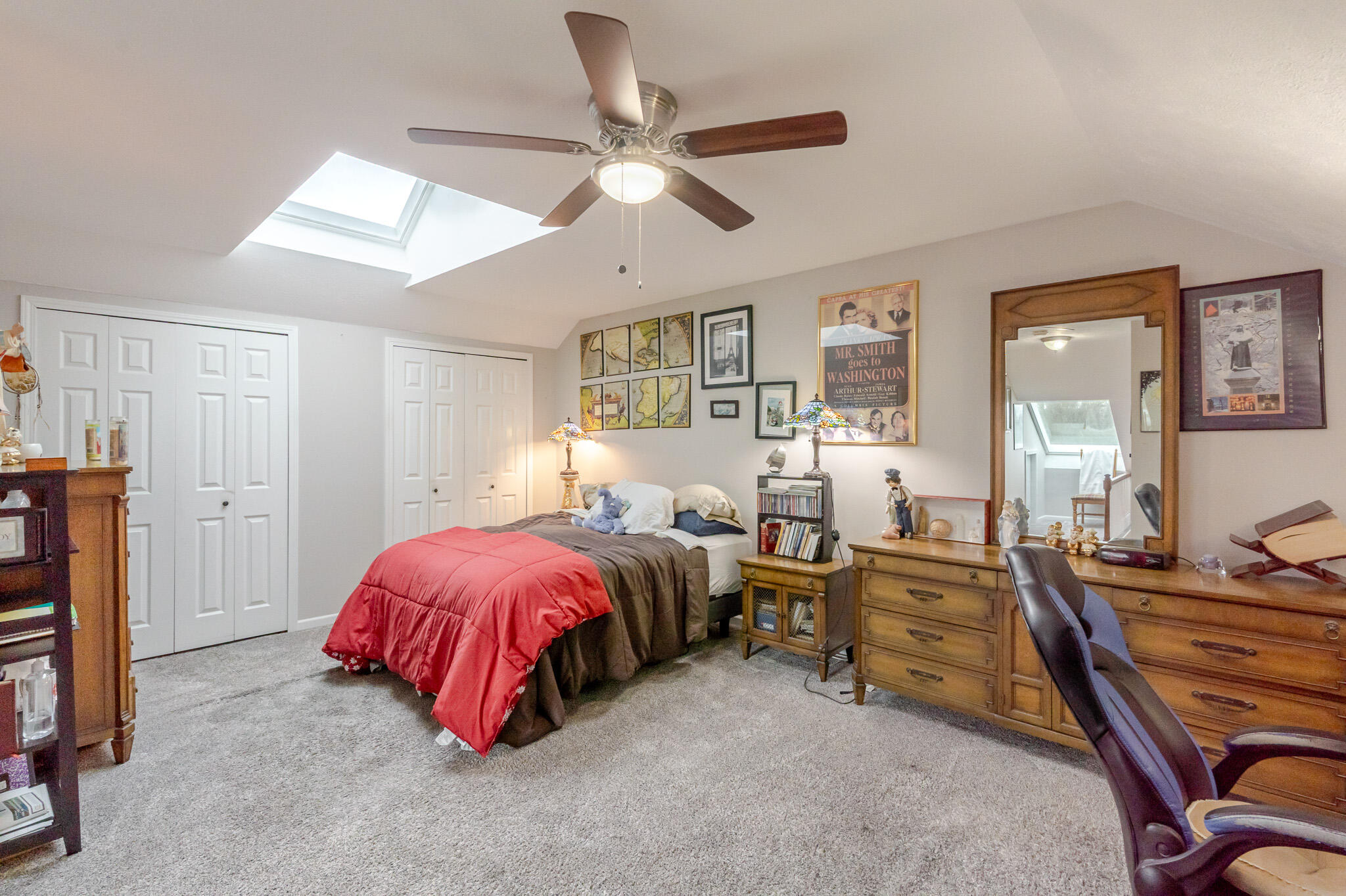 1300 Winding Ridge Lane, Unit A7 Valparaiso, IN 46383 - Photo 20 of 32 a bed room with a bed and a ceiling fan