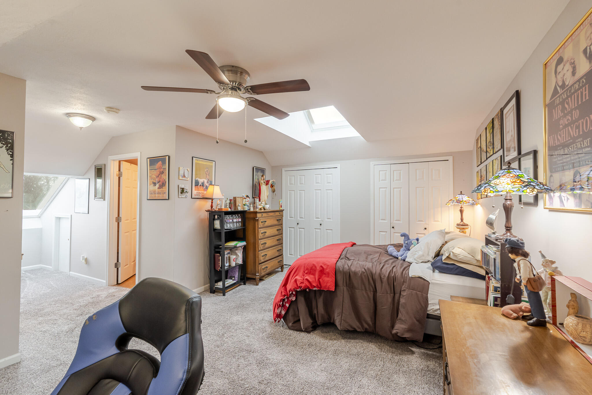 1300 Winding Ridge Lane, Unit A7 Valparaiso, IN 46383 - Photo 21 of 32 a bedroom with bed and a chandelier
