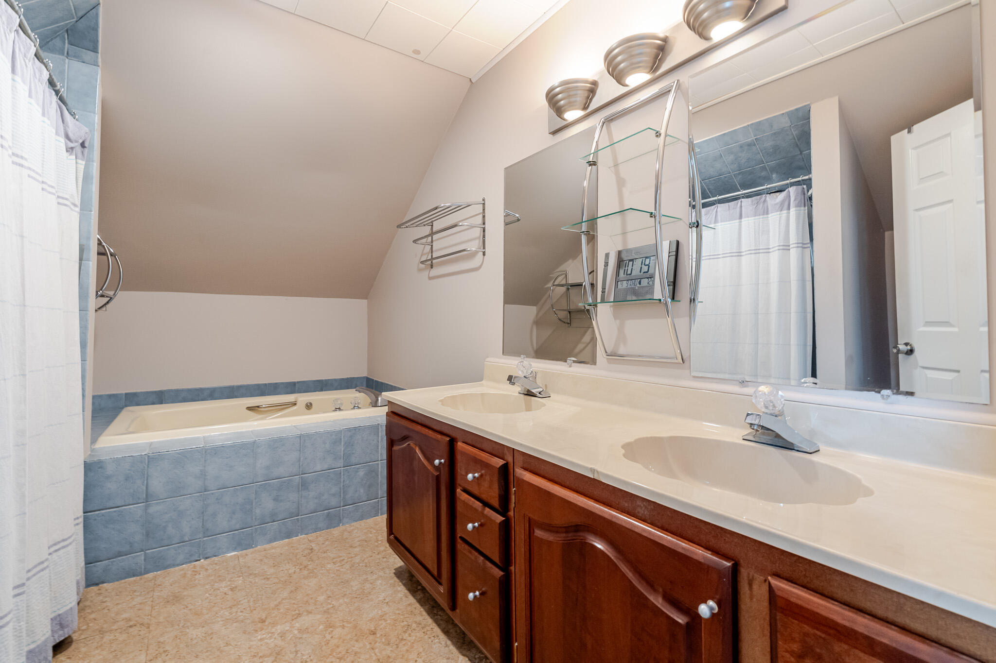 1300 Winding Ridge Lane, Unit A7 Valparaiso, IN 46383 - Photo 23 of 32 a bathroom with a sink and a mirror