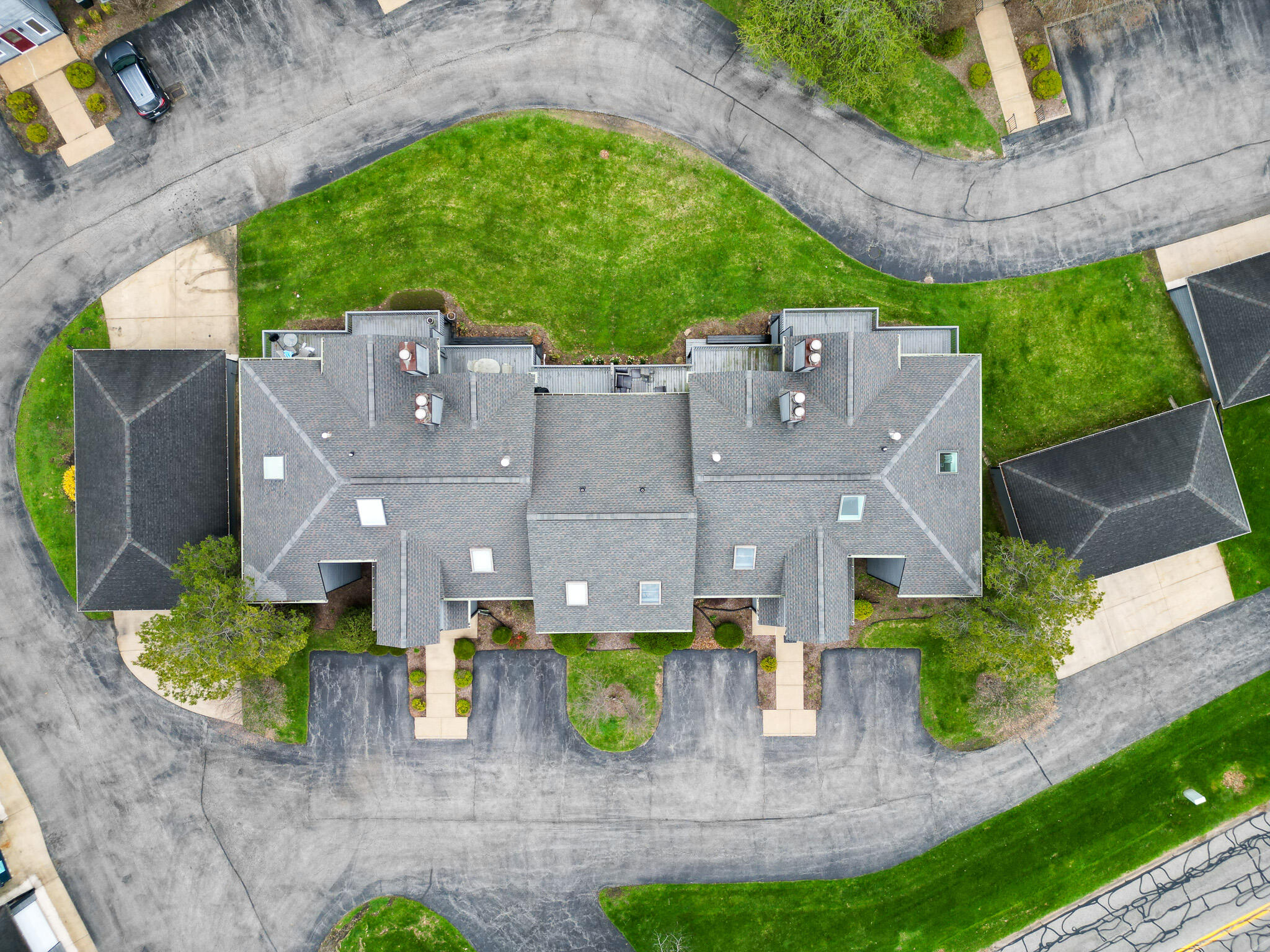 1300 Winding Ridge Lane, Unit A7 Valparaiso, IN 46383 - Photo 30 of 32 an aerial view of multiple houses with a yard