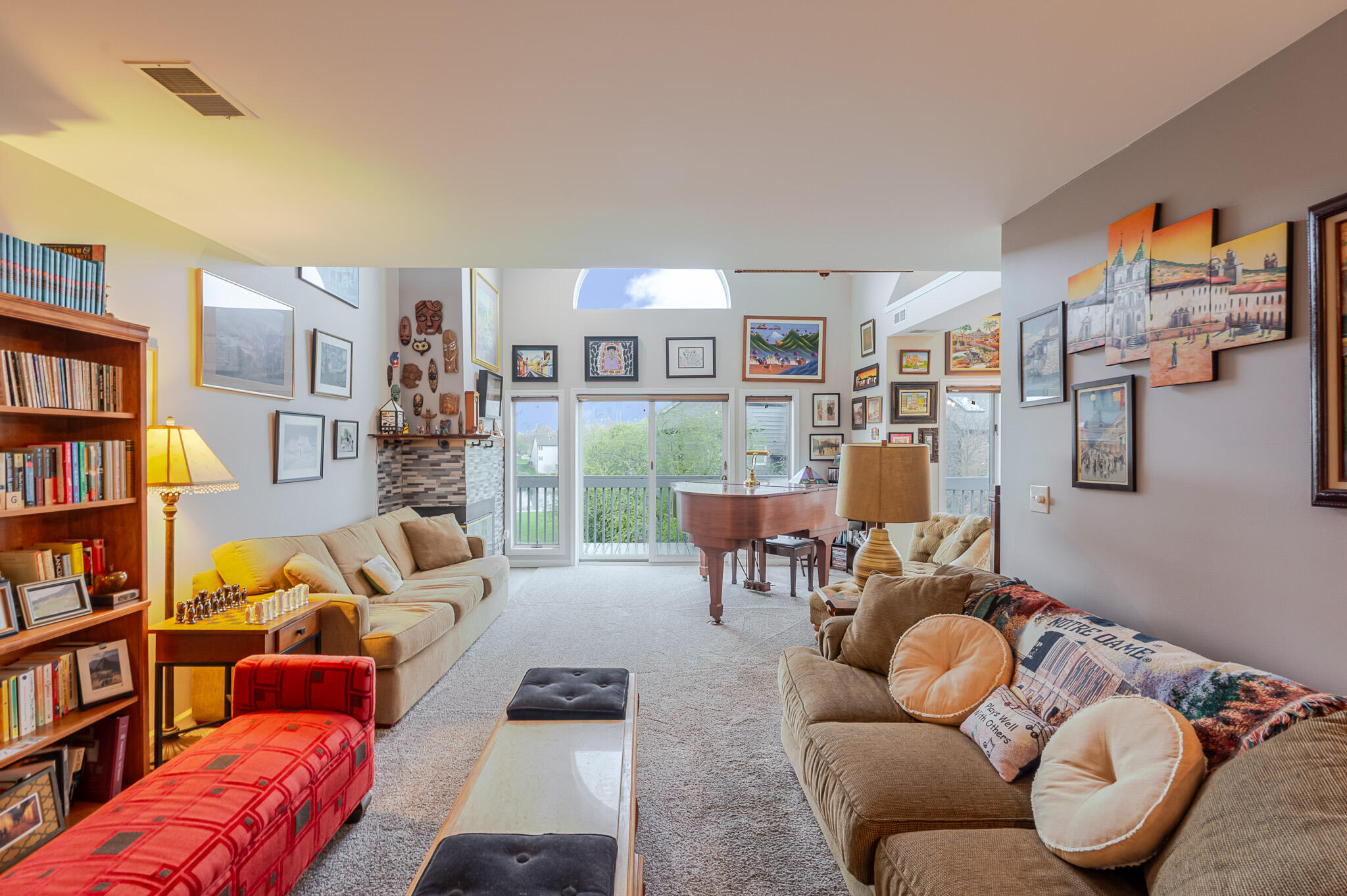 1300 Winding Ridge Lane, Unit A7 Valparaiso, IN 46383 - Photo 3 of 32 a living room with furniture and a book shelf