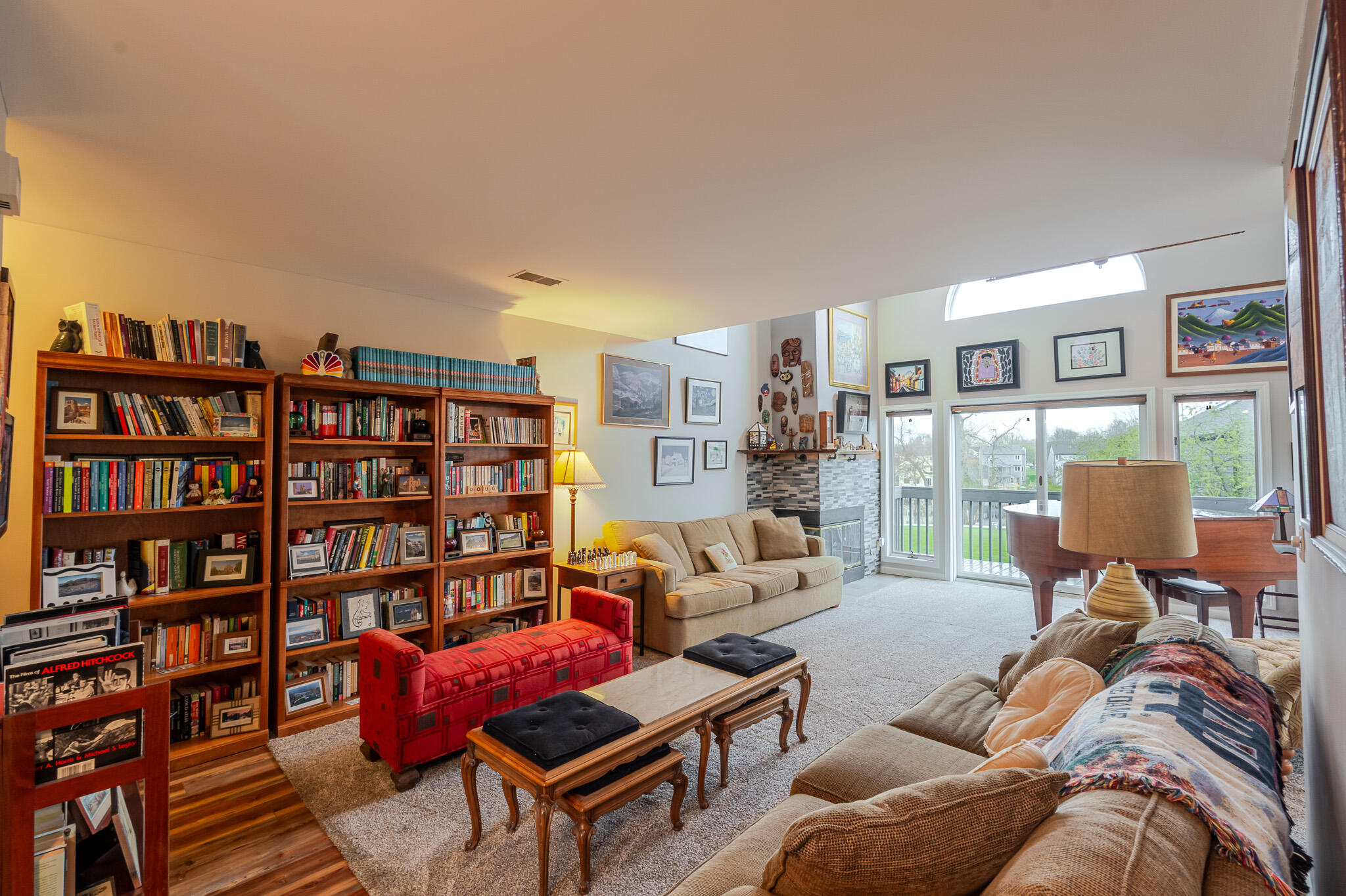 1300 Winding Ridge Lane, Unit A7 Valparaiso, IN 46383 - Photo 5 of 32 a living room with furniture and a book shelf