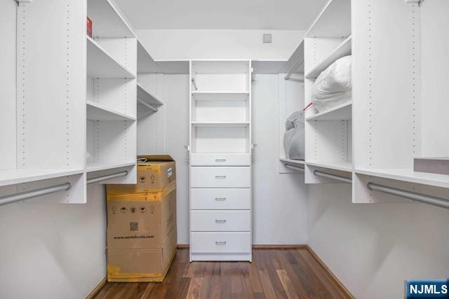 3219 City Place Edgewater, NJ 07020 - Photo 14 of 30 a view of walk in closet with empty racks