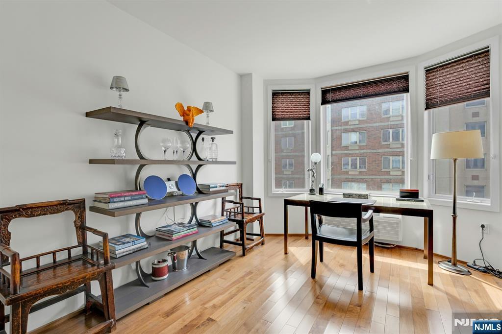 3219 City Place Edgewater, NJ 07020 - Photo 19 of 30 a view of a livingroom with furniture and wooden floor