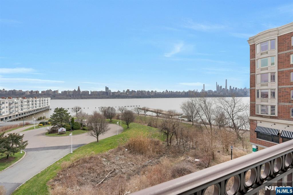 3219 City Place Edgewater, NJ 07020 - Photo 22 of 30 a view of a lake from a balcony