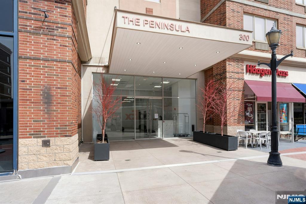 3219 City Place Edgewater, NJ 07020 - Photo 25 of 30 a building with a sign on the wall