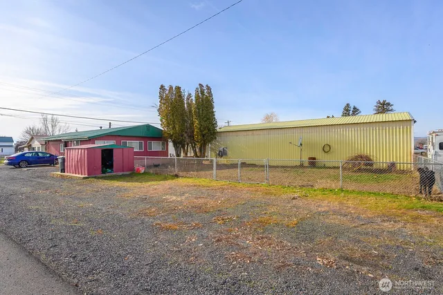 a view of a pool with a yard