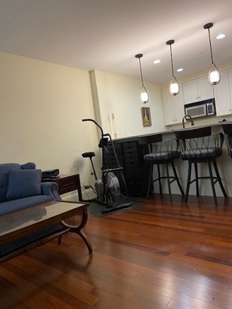 116 Rantoul Street, Unit 408 Beverly, MA 01915 - Photo 13 of 27 a view of a room with gym equipment