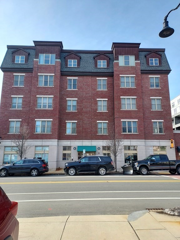 116 Rantoul Street, Unit 408 Beverly, MA 01915 - Photo 2 of 27 a buildings view