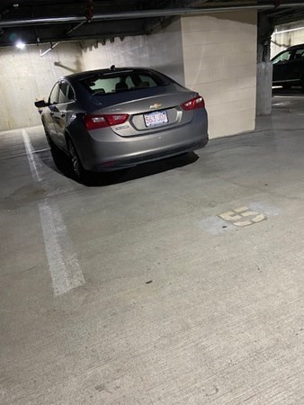 116 Rantoul Street, Unit 408 Beverly, MA 01915 - Photo 26 of 27 a car parked in a parking space