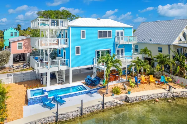 a view of a house with a swimming pool