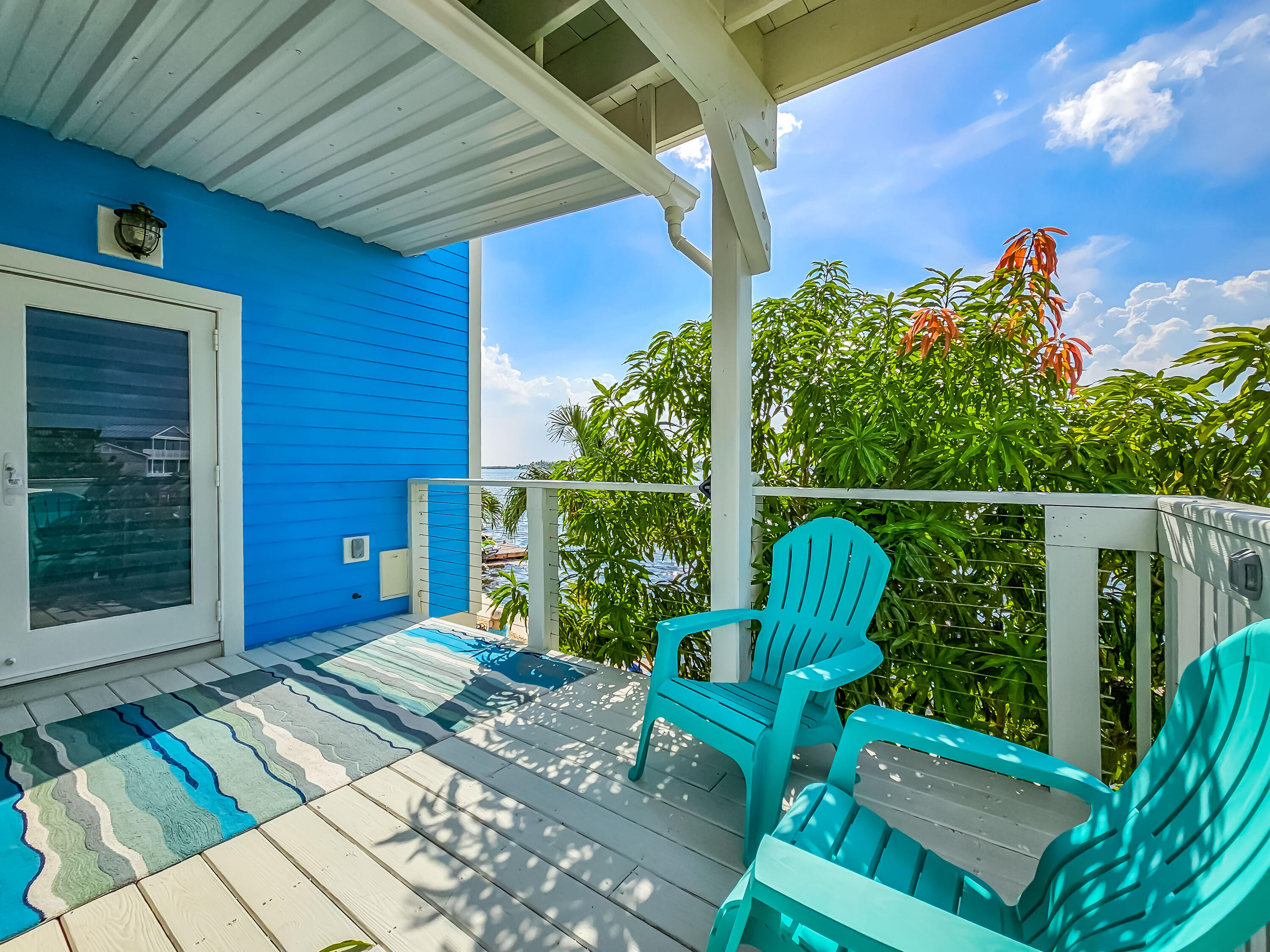 6 Shore Drive Key West, FL 33040 - Photo 18 of 45 a view of a chair and table in the patio