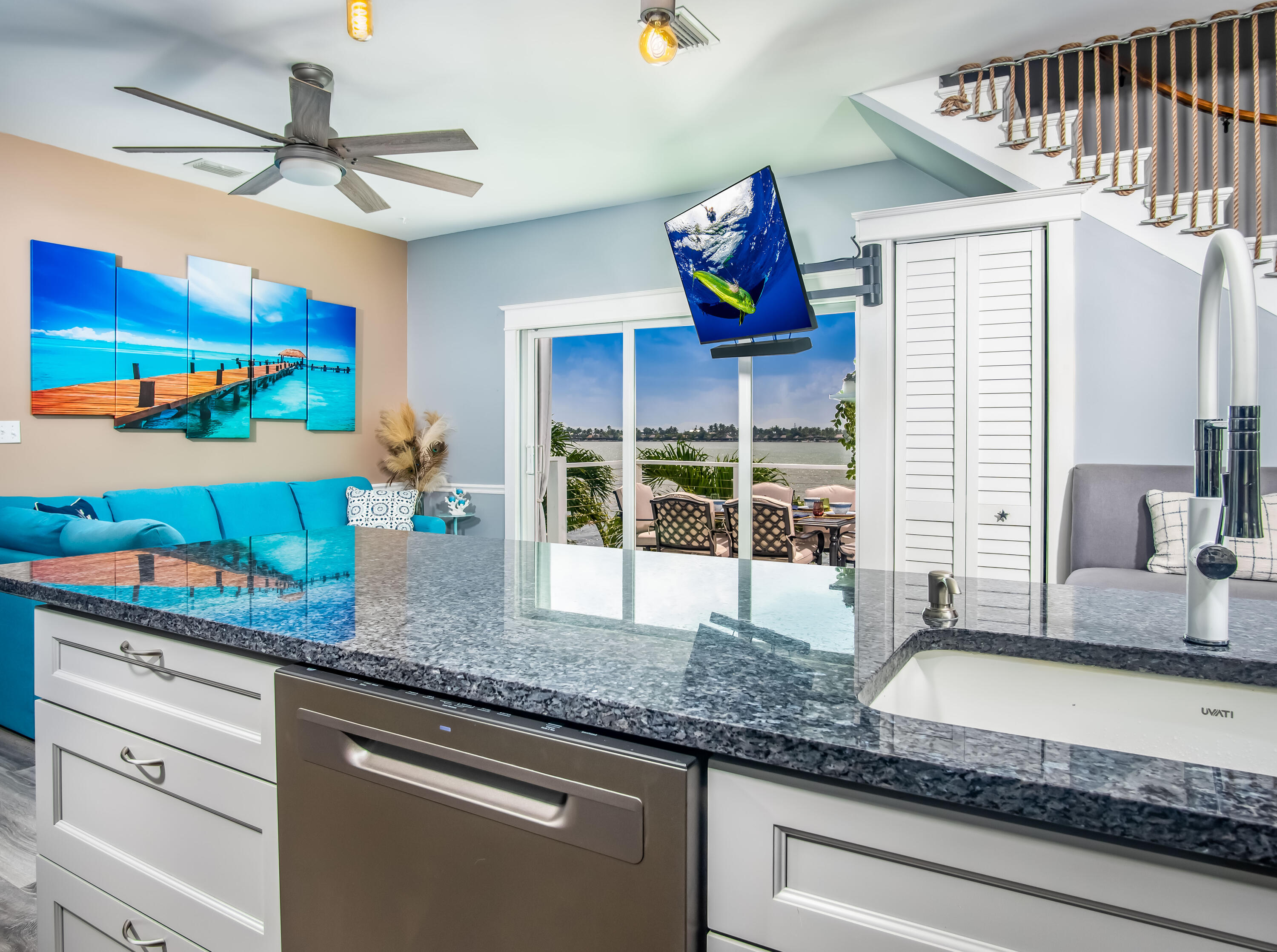 6 Shore Drive Key West, FL 33040 - Photo 24 of 45 a kitchen with stainless steel appliances granite countertop a sink and a counter space