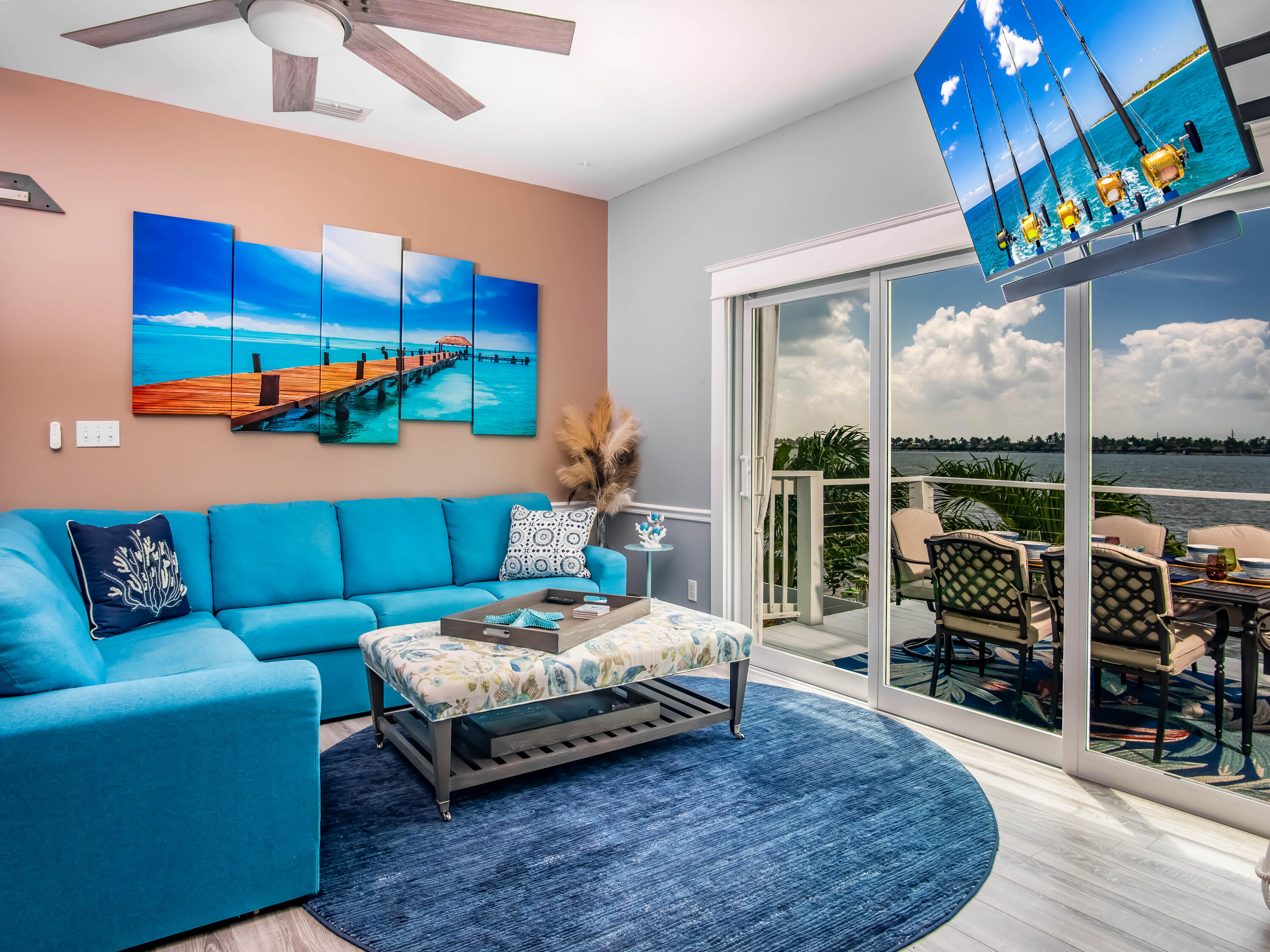 6 Shore Drive Key West, FL 33040 - Photo 27 of 45 a bedroom with furniture and a floor to ceiling window