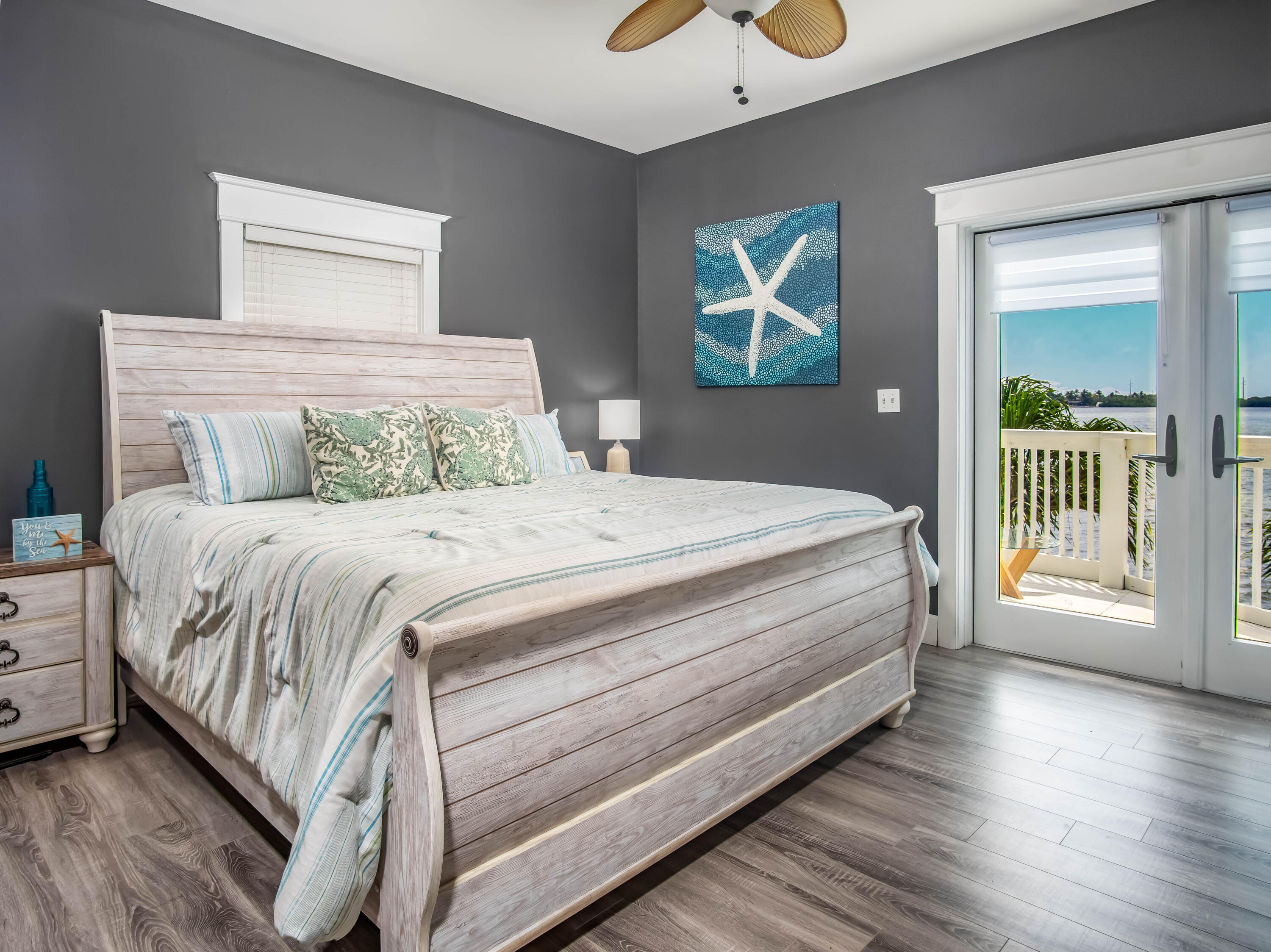 6 Shore Drive Key West, FL 33040 - Photo 32 of 45 a bedroom with a bed and a large window