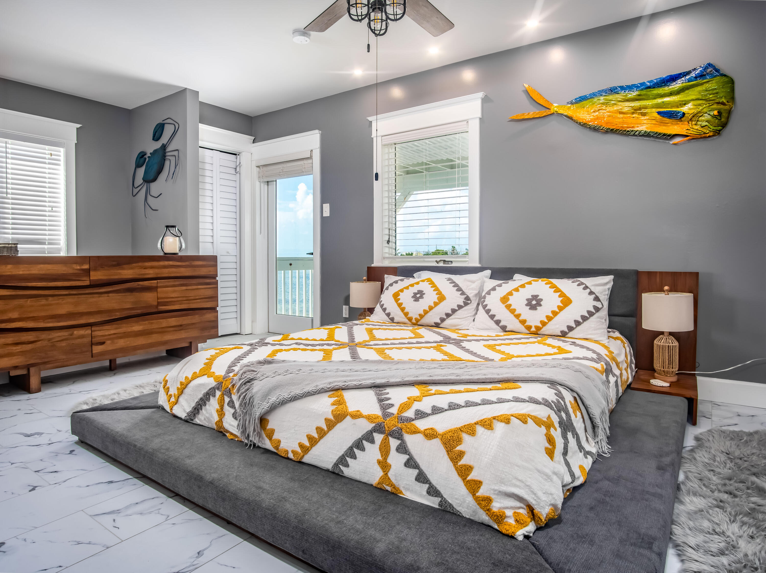 6 Shore Drive Key West, FL 33040 - Photo 35 of 45 a bedroom with a bed and painting on the wall