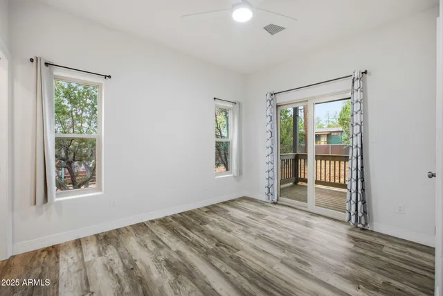 a kitchen with a refrigerator stove and microwave