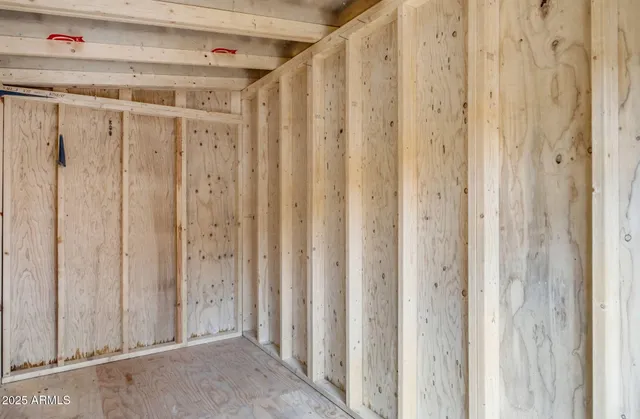 a view of a yard with a house and a tree
