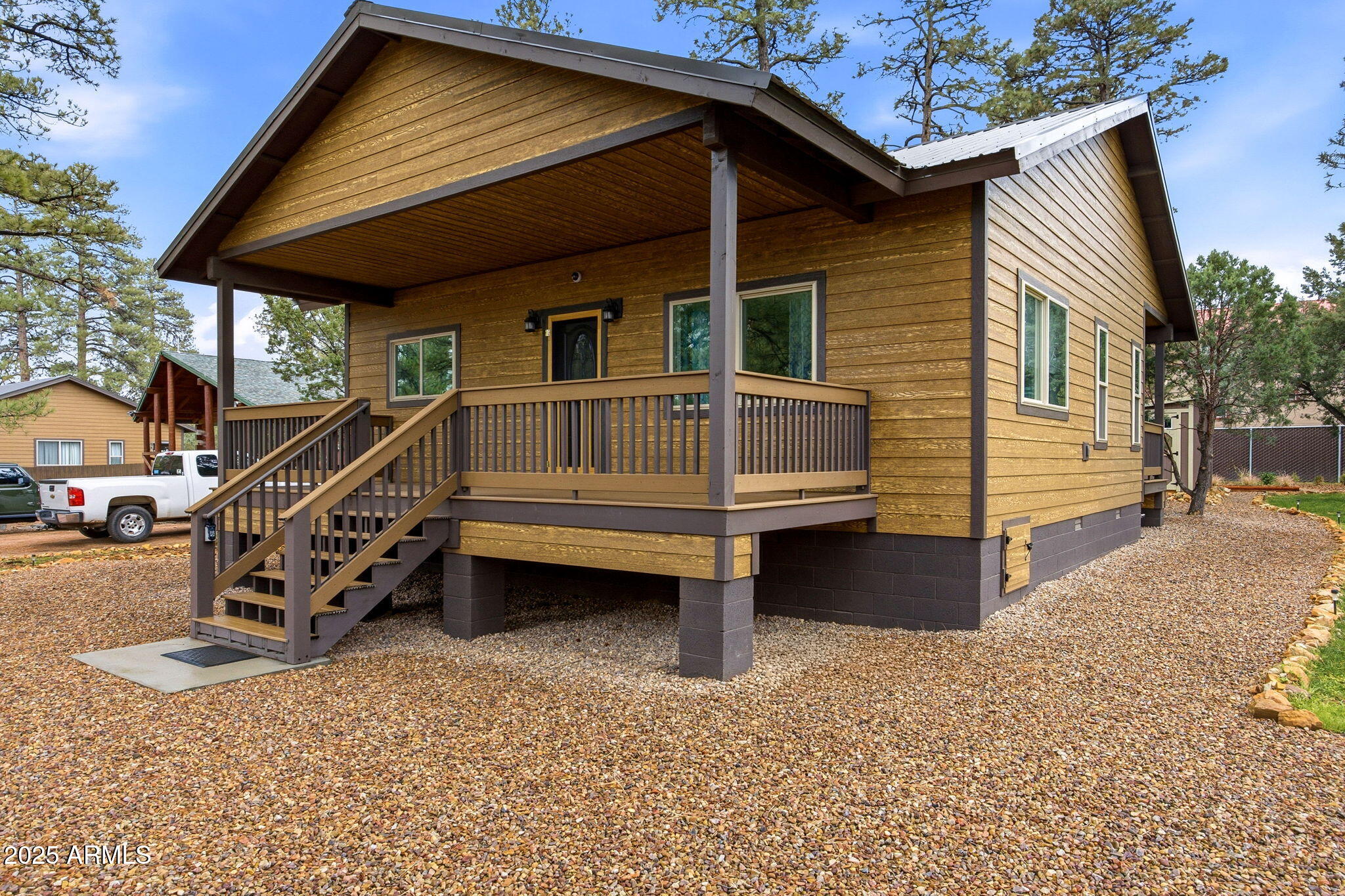1979 Christmas Pine Road Overgaard, AZ 85933 - Photo 3 of 33 a view of backyard with deck and outdoor seating