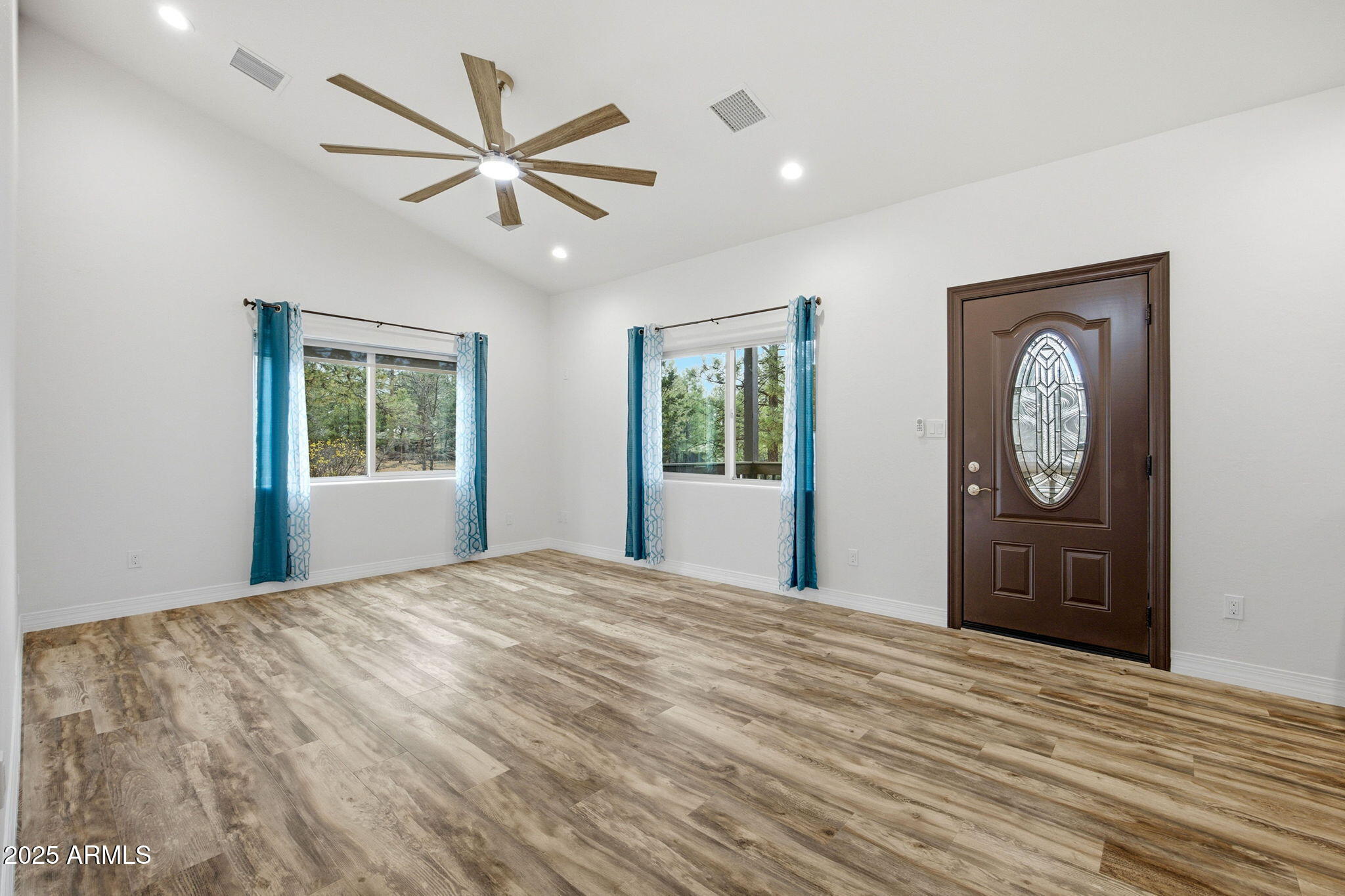 1979 Christmas Pine Road Overgaard, AZ 85933 - Photo 6 of 33 a bedroom with a large bed and a window