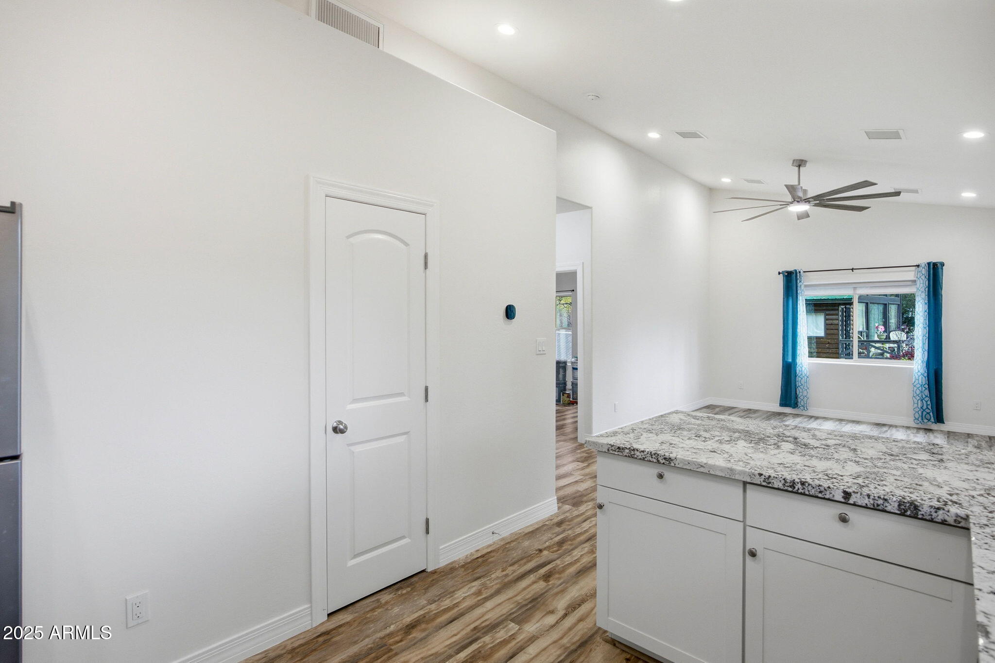 1979 Christmas Pine Road Overgaard, AZ 85933 - Photo 9 of 33 a bathroom with a granite countertop sink and mirror