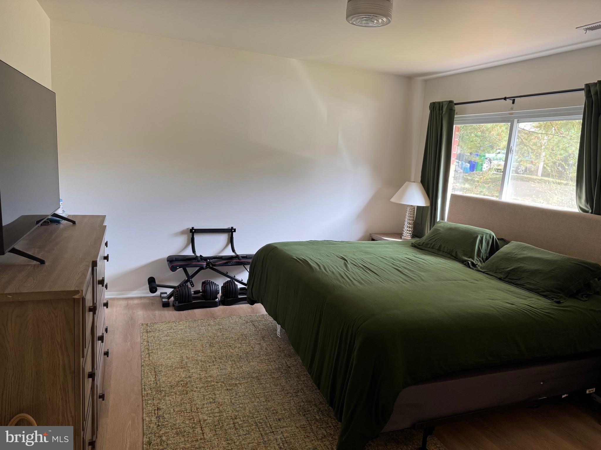 5656 Shadow Fall Terrace Columbia, MD 21045 - Photo 32 of 41 a bedroom with a bed and a window