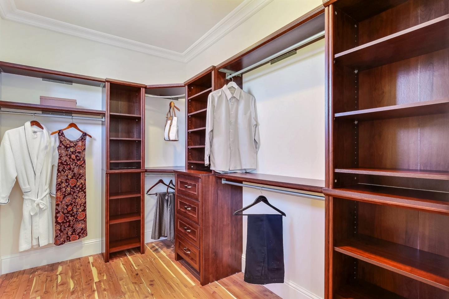 10438 North Stelling Road Cupertino, CA 95014 - Photo 14 of 22 a view of walk in closet with clothes and shoes