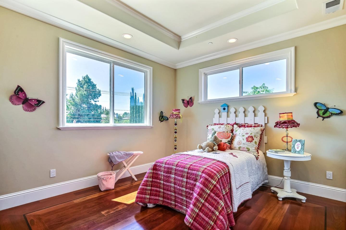 10438 North Stelling Road Cupertino, CA 95014 - Photo 15 of 22 a bedroom with a bed and wooden floor