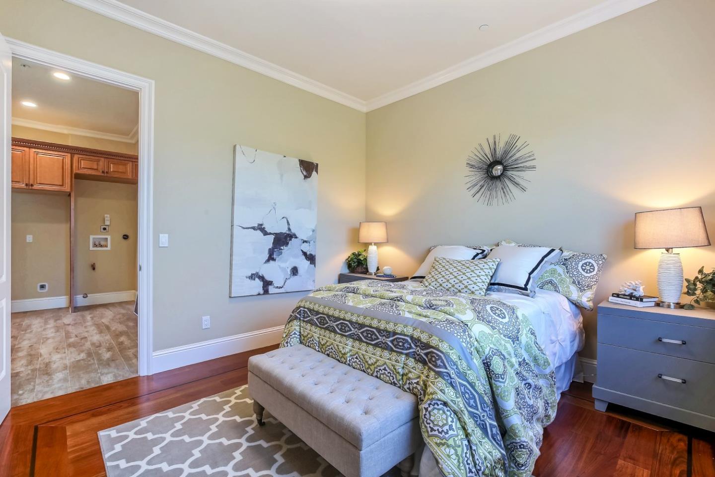 10438 North Stelling Road Cupertino, CA 95014 - Photo 19 of 22 a bedroom with a bed and a lamp on dresser