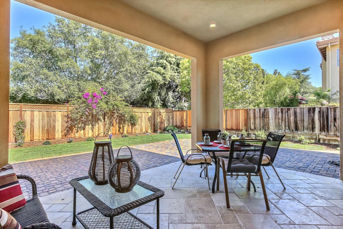 10438 North Stelling Road Cupertino, CA 95014 - Photo 21 of 22 a view of a patio with a dining table and chairs