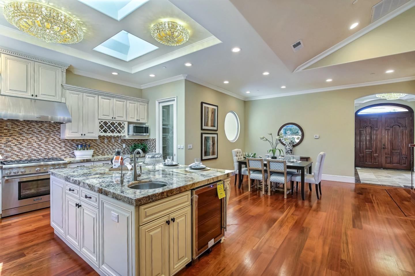 10438 North Stelling Road Cupertino, CA 95014 - Photo 6 of 22 a kitchen with stainless steel appliances granite countertop a stove and a wooden floors